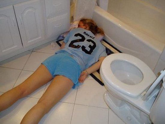Girl passed out drunk Stock Photos and Images