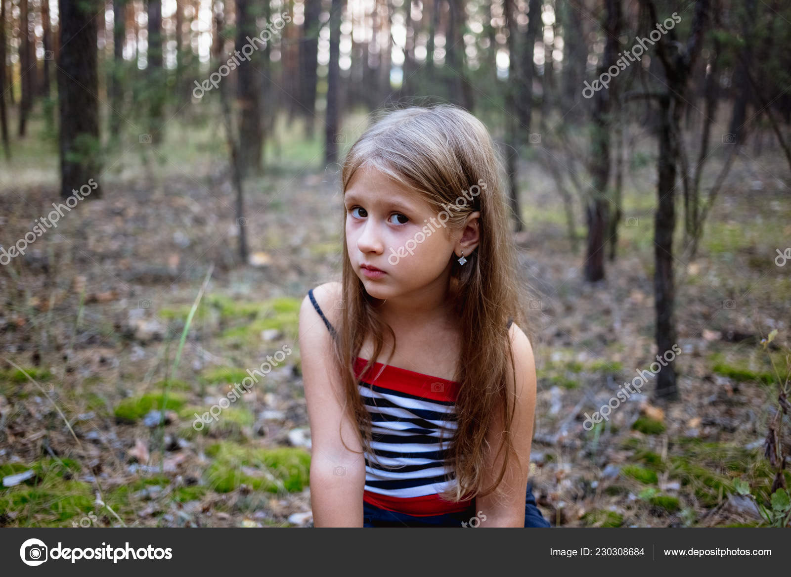 Little girl in forest creek Stock Photos and Images